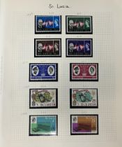 A large group of assorted world stamps, including Rhodesia, New Zealand, Papua New Guinea,