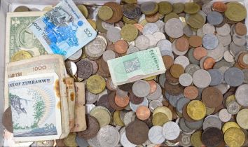 Assorted world coins, and a group of banknotes