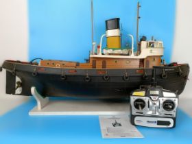 A remote controlled model steam tug, from a Mobile Marine models kit, 100 cm Steam sound and lights,