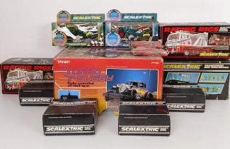 A Scalextric car, C306, C305, assorted others Scalextric cars, and a Tandy Turbo T-Buggy (box)