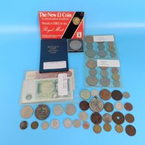 Assorted world coins, and a small group of banknotes