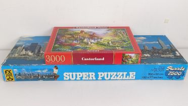 A 7500 piece super jigsaw puzzle, and a 3000 piece jigsaw puzzle (2) Provenance: Sold on behalf of