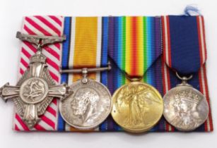 A group of four medals, awarded to 2 Lieut C N C Dickson RAF, comprising an AFC, British War