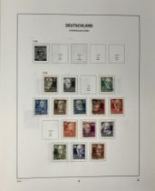 A collection of German stamps, in eleven albums (box)