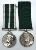 A Royal Naval Reserve LS & GC Medal, awarded to 3121 U C Kennedy STO RNR, and a Volunteer Long
