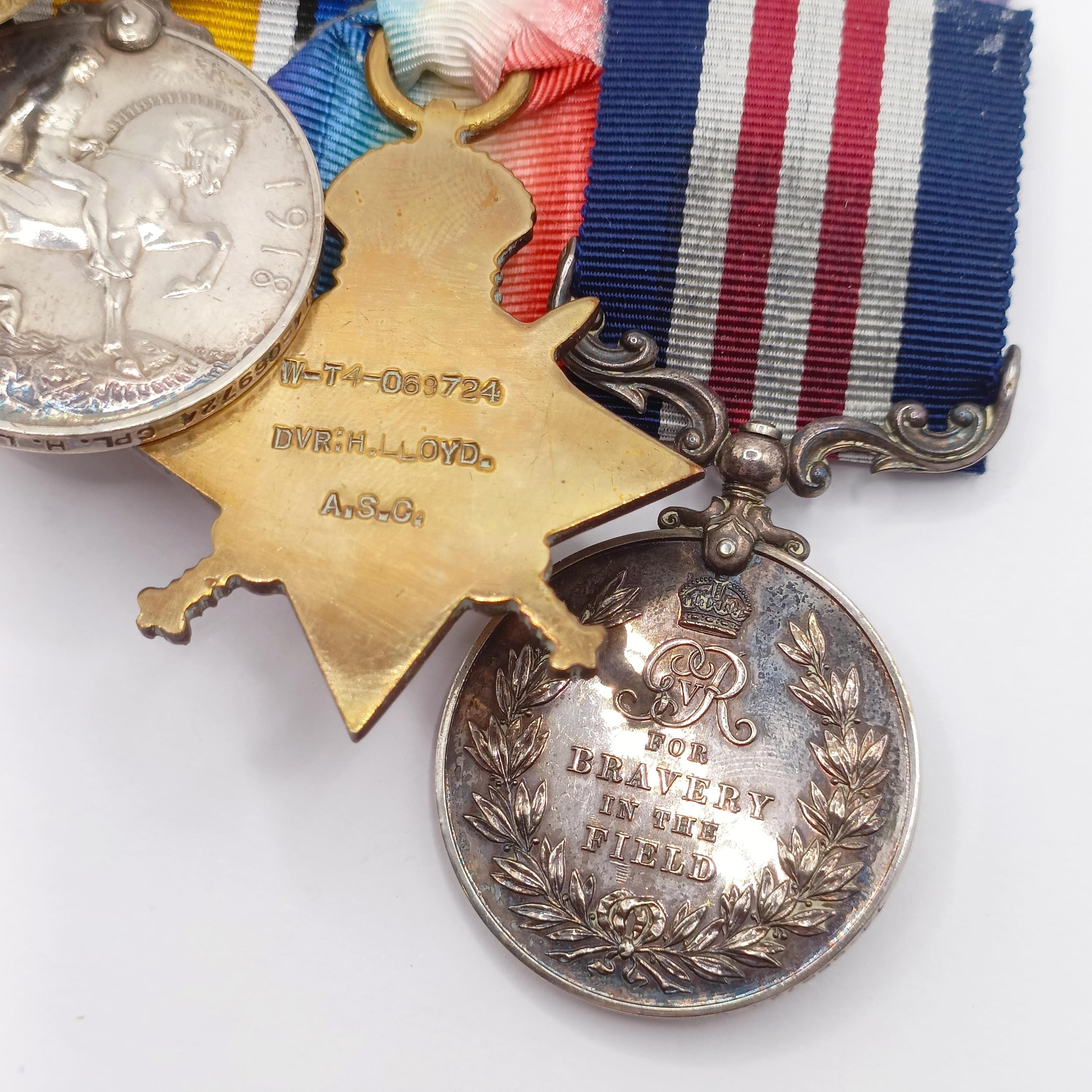 A group of four medals, awarded to T4-069724 Cpl H Lloyd, 332/Coy ASC, and a 1914-15 Star Trio - Image 8 of 9