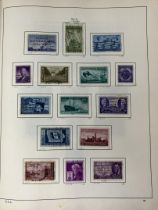An album of American stamps, some on loose pages, an album of Pakistan stamps, and another album (4)