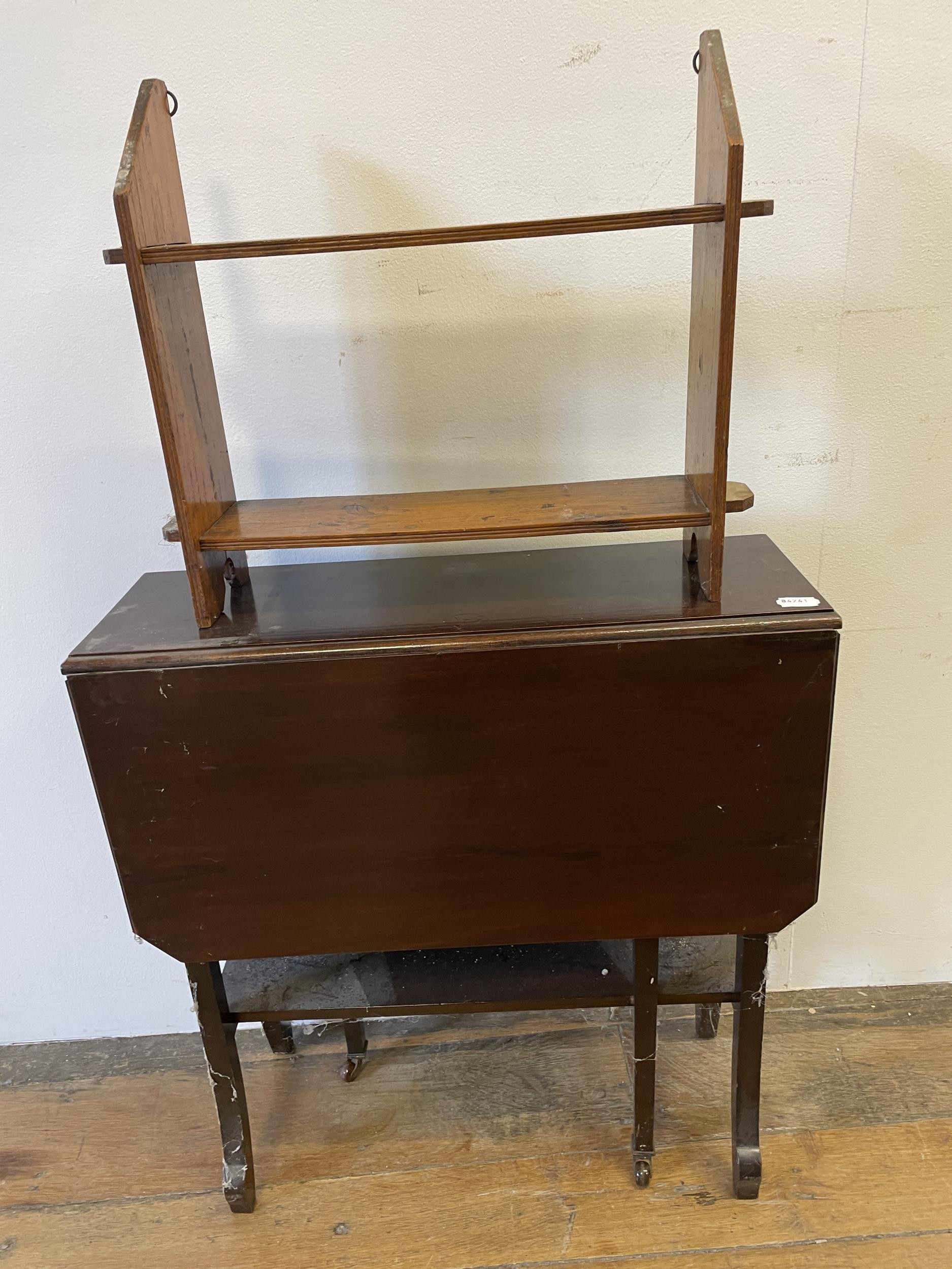 A walnut Sutherland table, a wall shelf, a trunk, a single chair, a commode stool, a shaving