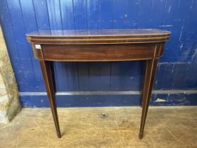 A mahogany demi lune card table, 92 cm wide and a mahogany side table (2)