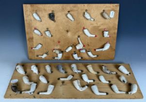 Assorted clay pipes, and a group of vintage biscuit tins (qty)