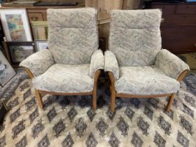 A pair of Ercol armchairs (2)