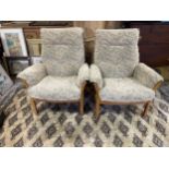 A pair of Ercol armchairs (2)