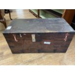 A brass bound teak trunk, with a later lock, 92 cm wide, a corner cabinet and a bedside chest with