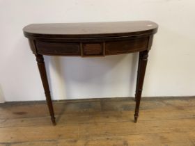 A mahogany demi-lune folding card table, 92 cm wide