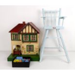 A Tri-ang style dolls house, assorted furniture, a doll size highchair, and a dolls tea set (qty)