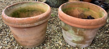 A large pair of terracotta garden planters, 68 cm diameter