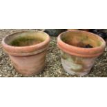 A large pair of terracotta garden planters, 68 cm diameter