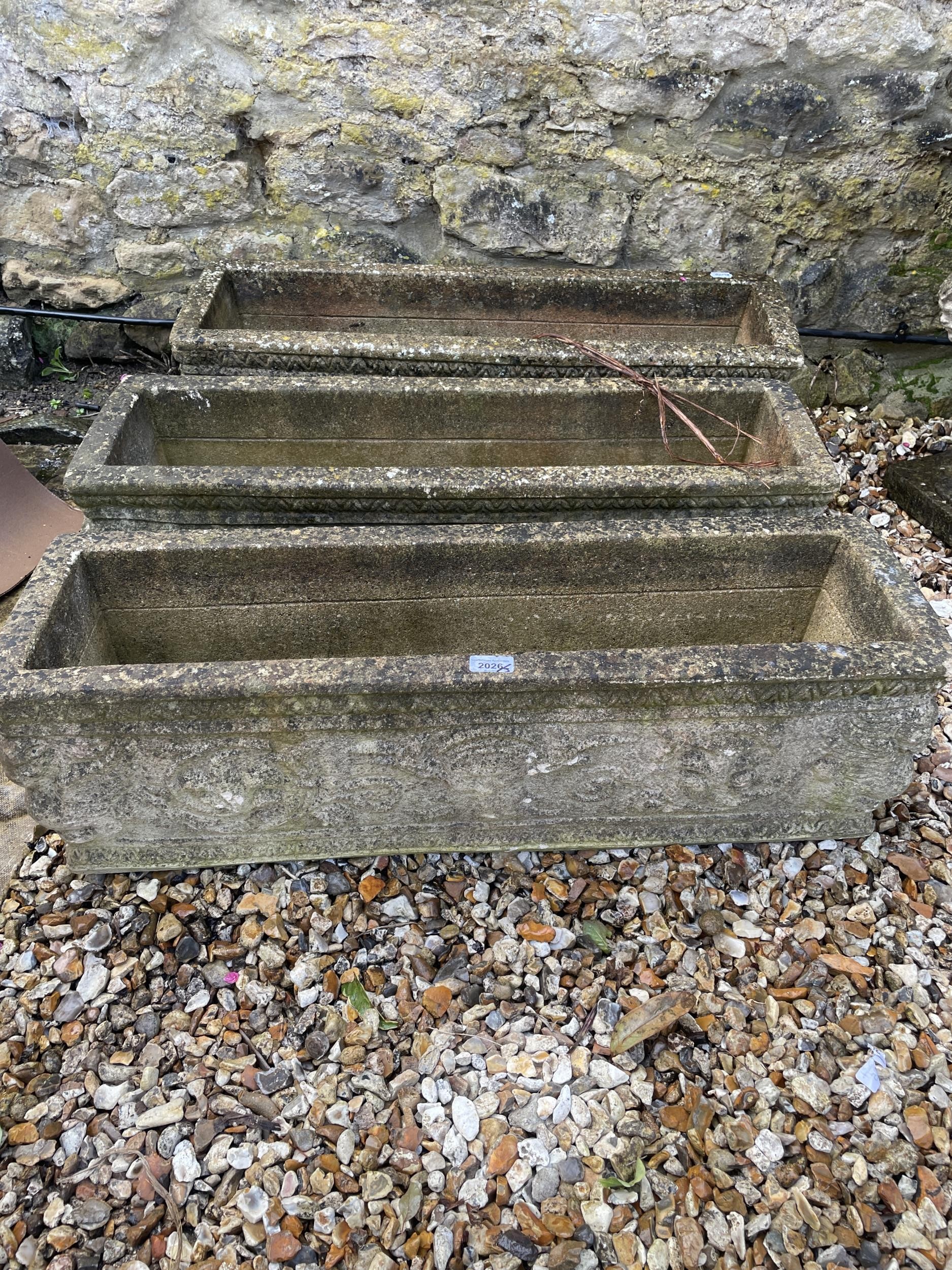 A set of three composite stone rectangular garden troughs, 90 cm wide (3)