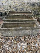 A set of three composite stone rectangular garden troughs, 90 cm wide (3)