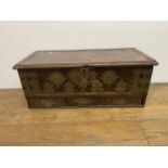 An Eastern mahogany and brass bound coffer, top loose, 106 cm