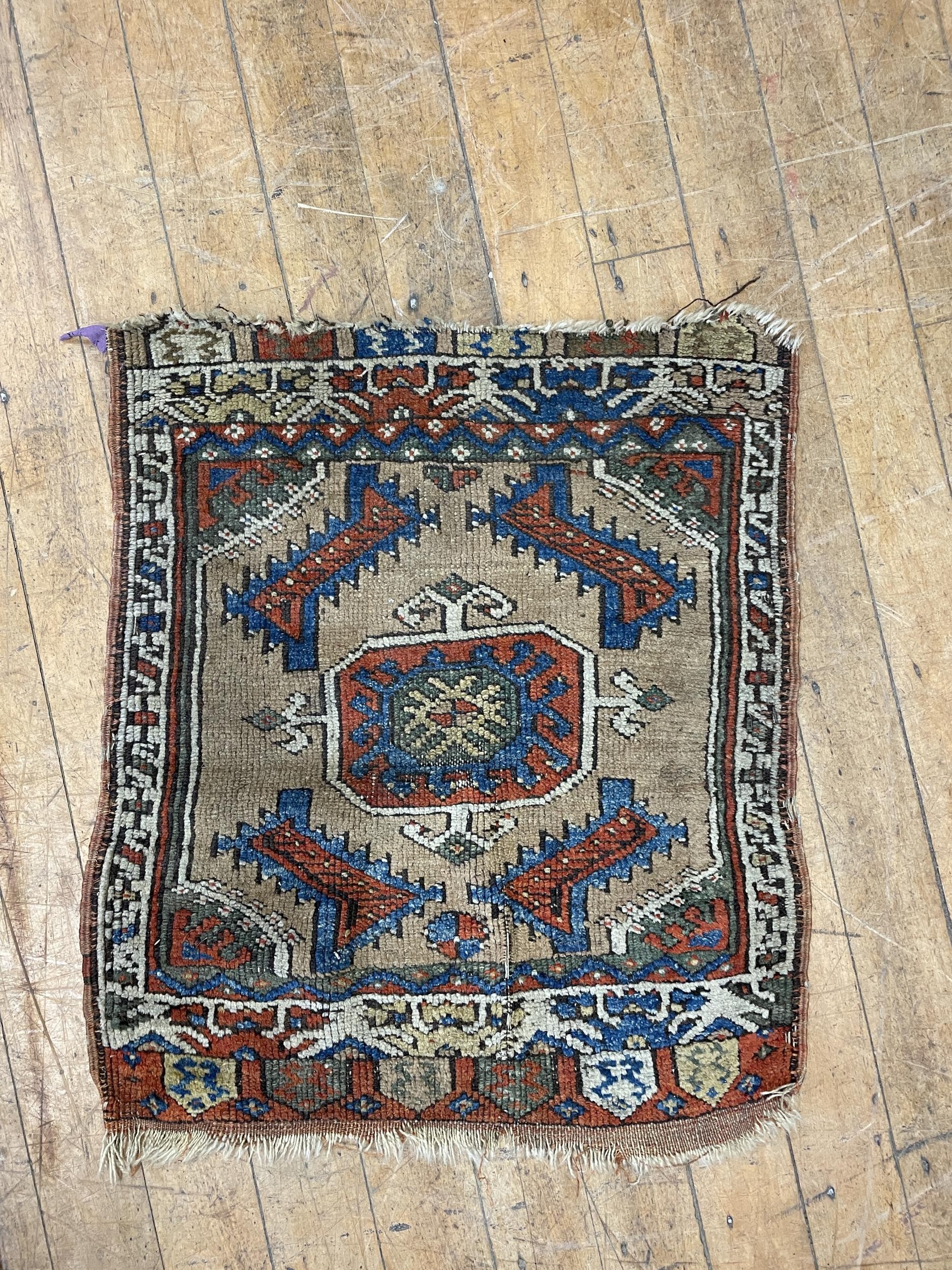 A Persian red ground rug, 284 x 79 cm, and a Persian rug, 64 x 54 cm - Image 2 of 2