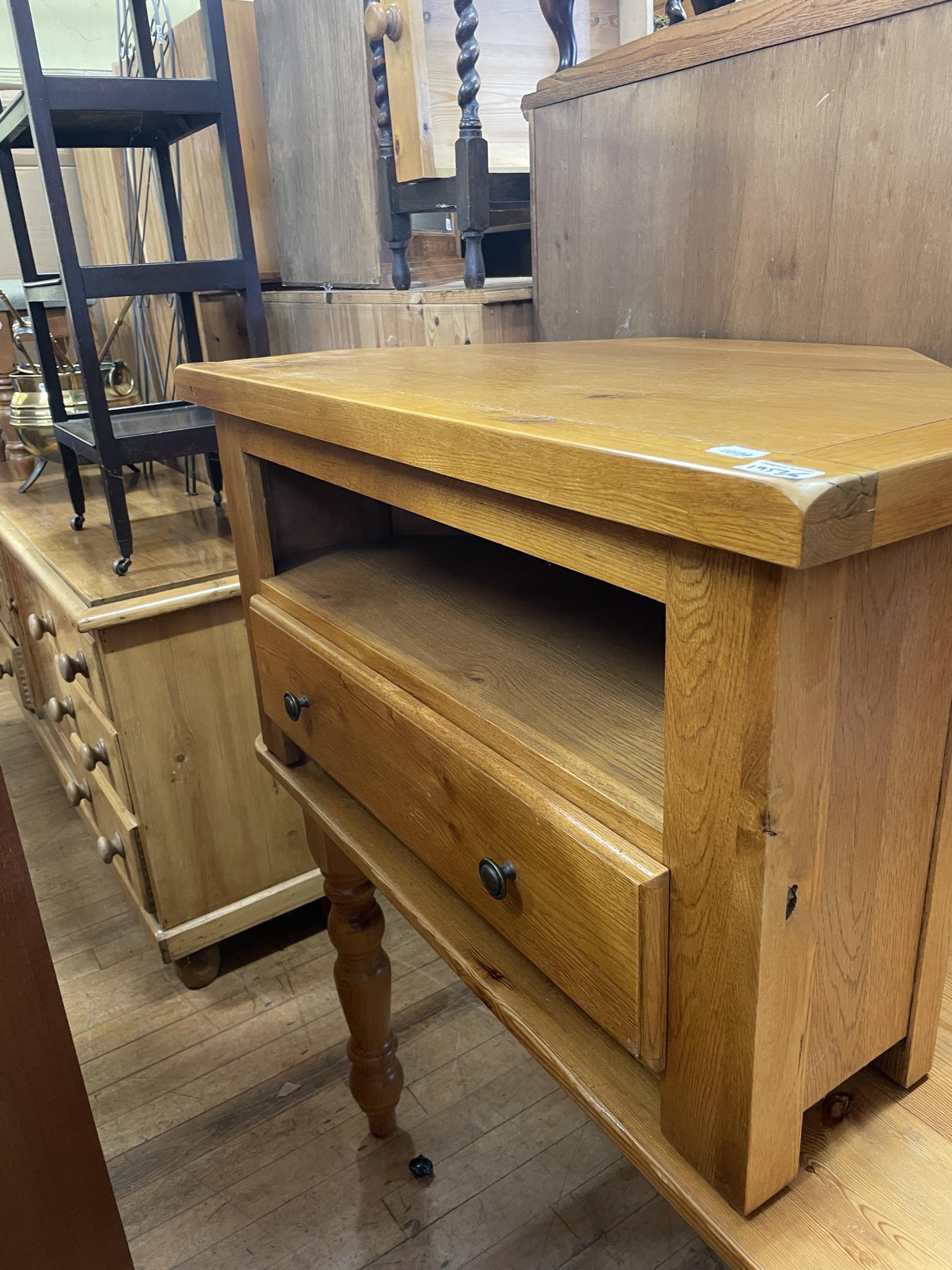 A pine kitchen table, 168 cm wide, a TV stand, a chest of three drawers, a side cabinet, a stool, - Image 2 of 2