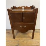 A mahogany tray top commode