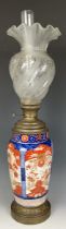 A Japanese Imari vase, converted to an oil lamp, with an acid etched glass shade, 46 cm high, and