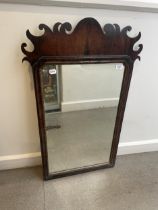 A mahogany fret framed mirror, 97 x 59 cm