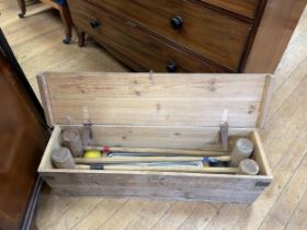 A vintage croquet set, and two extra mallets