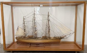 A model of the Cutty Sark, in a teak and perspex case, 140 cm wide