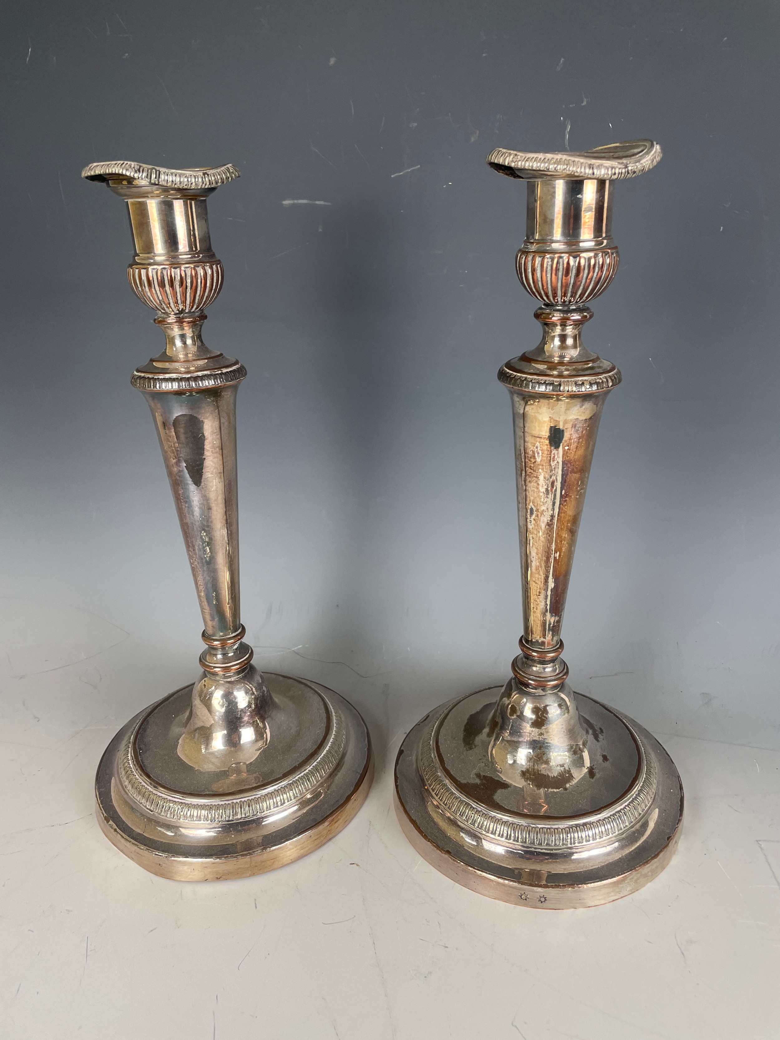 A pair of silver plated candlesticks, silver plate and other items (box)