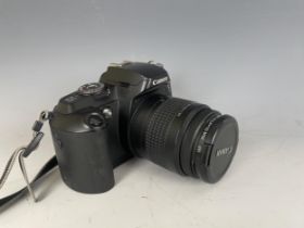 A Canon EOS 5000 camera, and assorted photography equipment (qty)