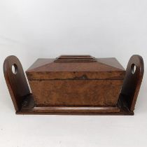 A Victorian walnut hardstone and metal mounted book stand, and a walnut tea caddy (2)