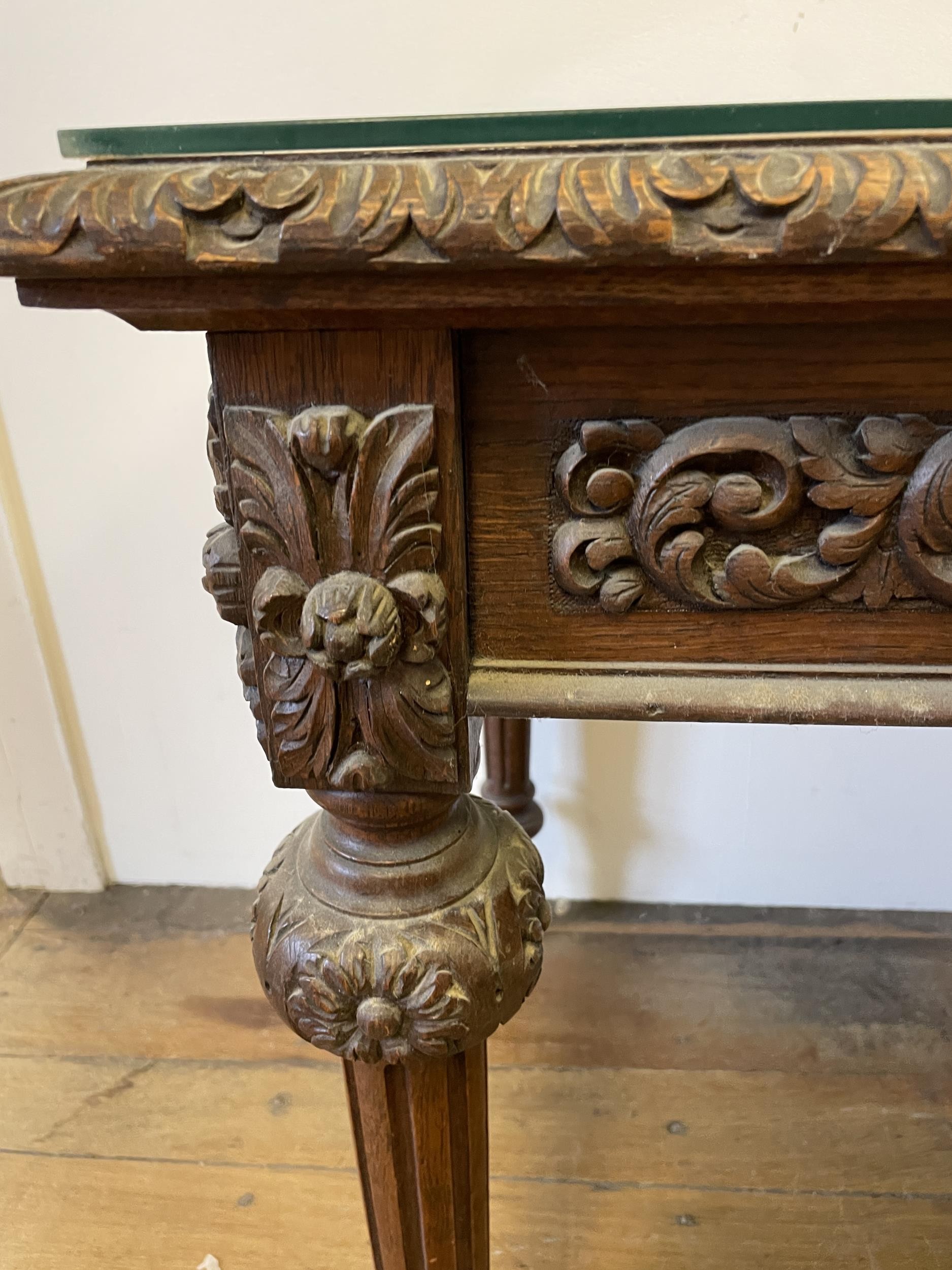 An oak writing desk, with a tooled and gilt leather top, having two drawers, on carved turned and - Image 3 of 4