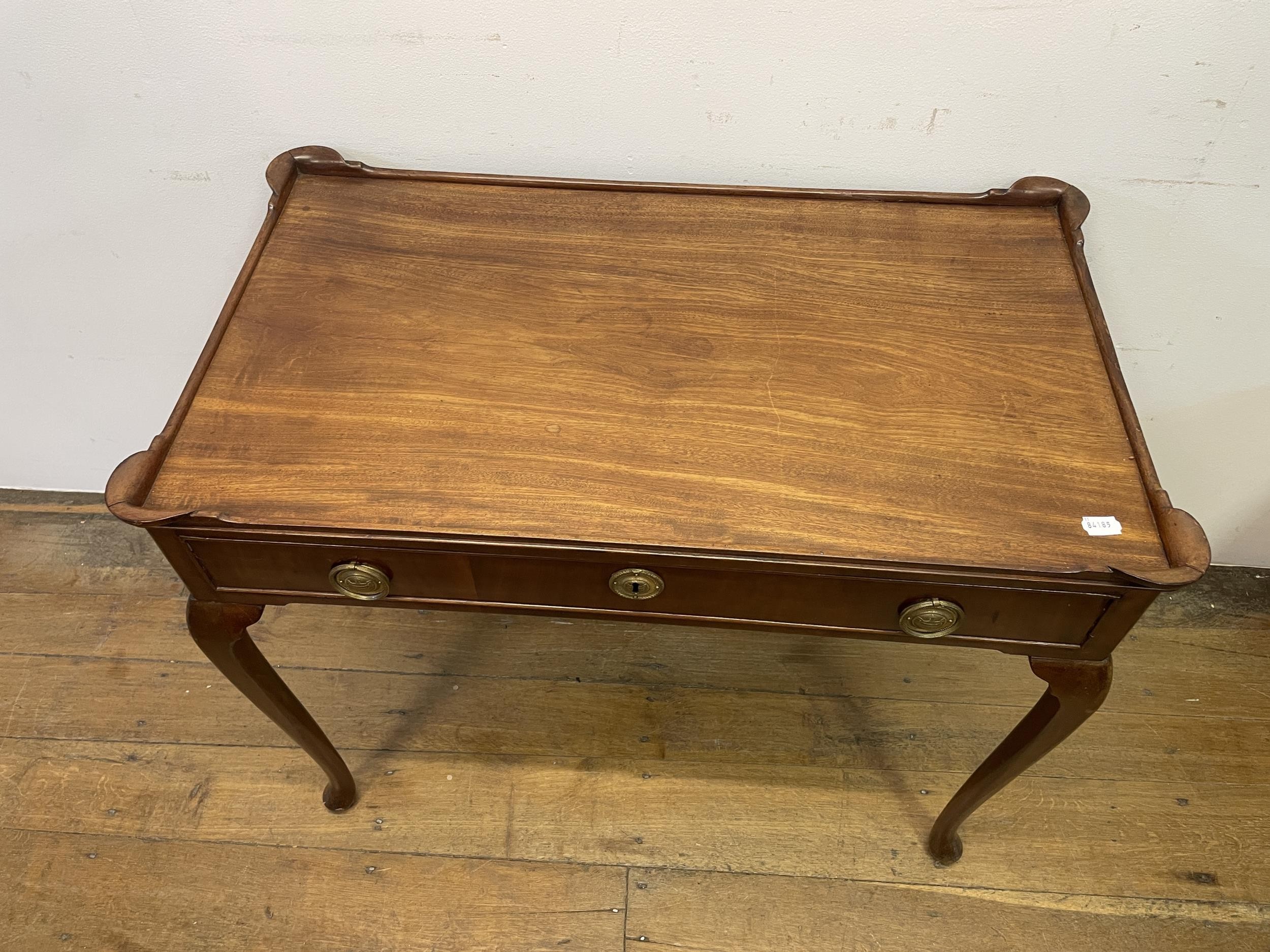 A Dutch mahogany table, having a raised rim, with a single frieze drawer on cabriole legs and pad - Image 2 of 5