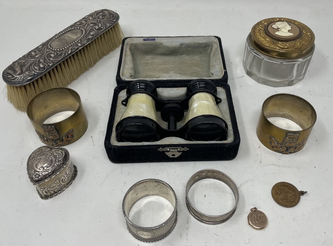 A 9ct gold locket, a silver plated napkin ring, a pair of opera glasses and other items