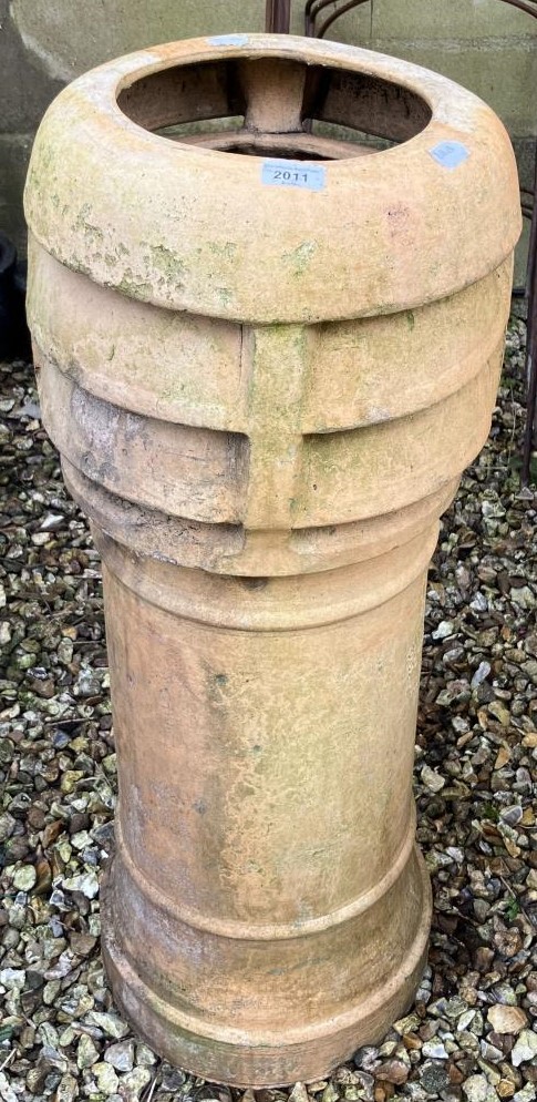 A chimney pot, stamped Bourne Valley Pottery, Poole, Dorset, 95 cm high