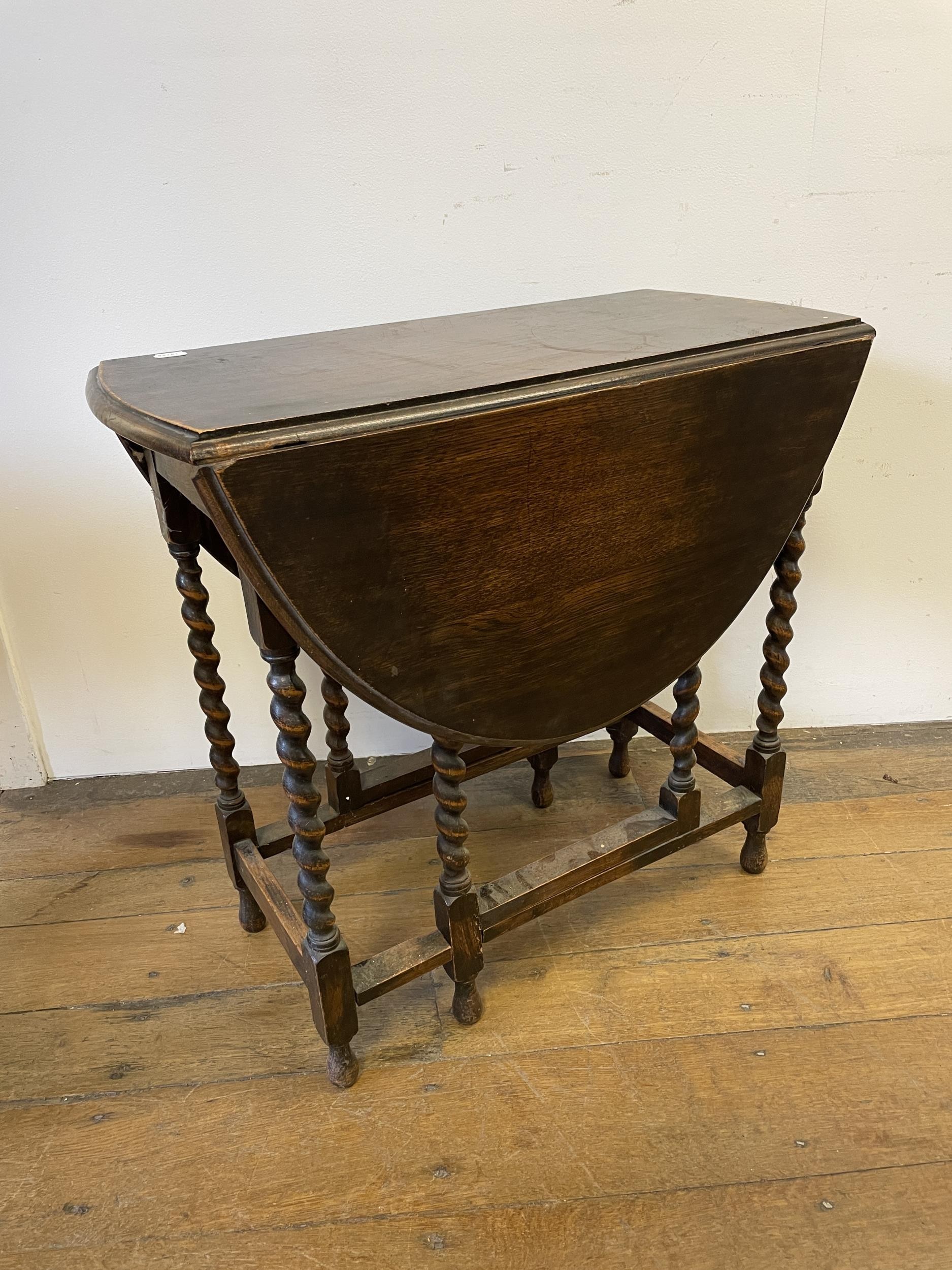 A bookcase, a side table, three mirrors, a drop leaf table, a nursing chair, two cast metal - Image 4 of 13