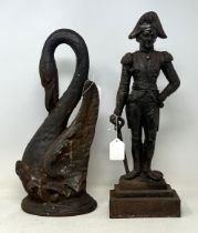 A late 19th century cast iron doorstop, in the form of a swan, 38 cm high, and another (2)