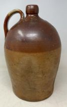 A stoneware flagon, 43 cm high, a large glass bottle, a suitcase filled with silver plated glass