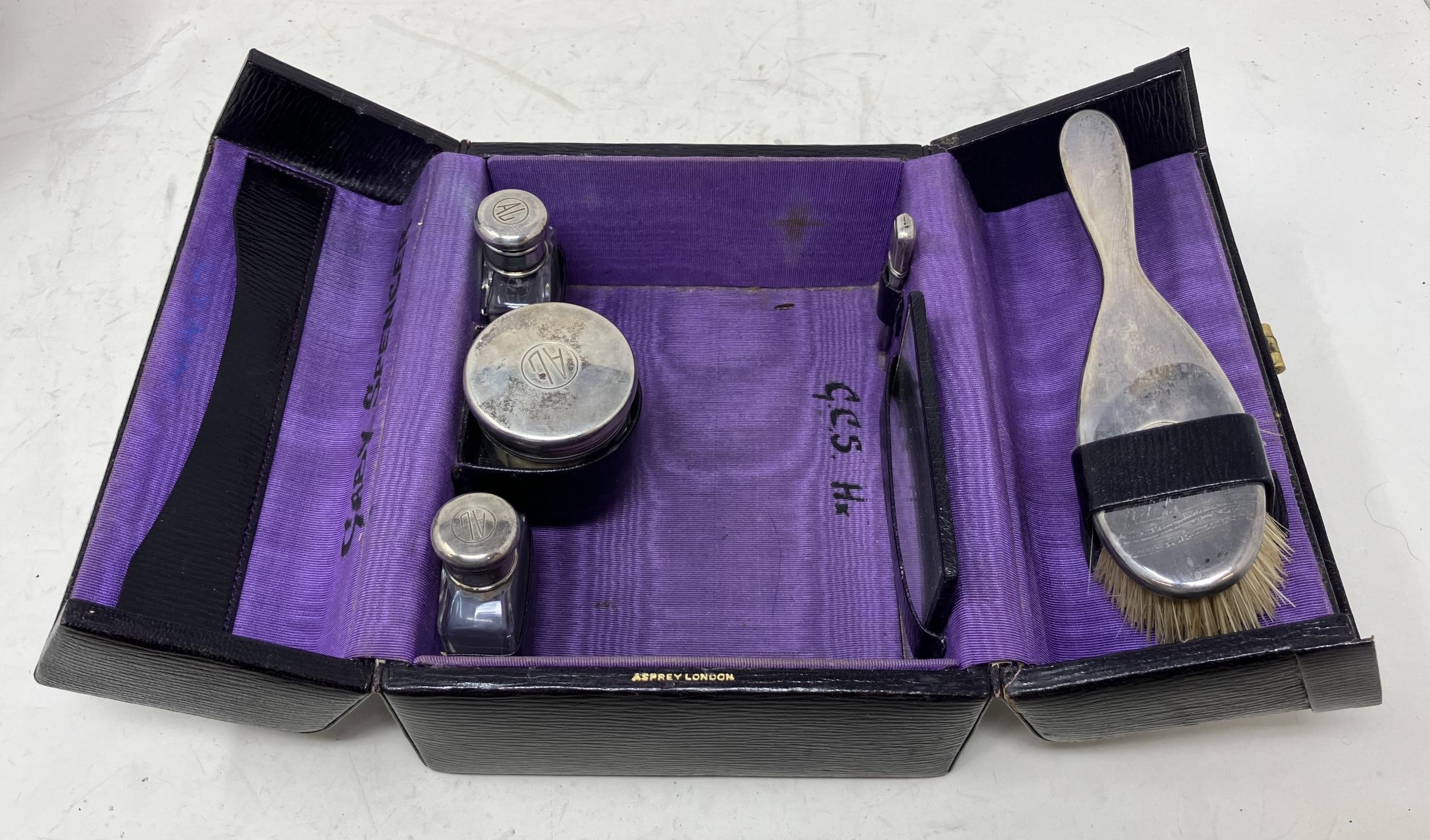 A Dutch treen tobacco box, and a small leather covered travelling vanity case, with silver - Image 4 of 5