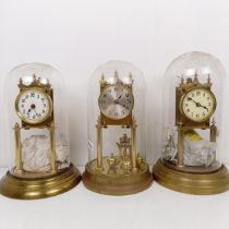 Three 400 day clocks, under glass domes (3)