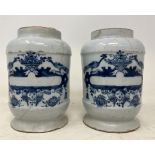 A pair of 19th century Delft pottery jug jars, with a vacant cartouche, repaired/restored, 14 cm