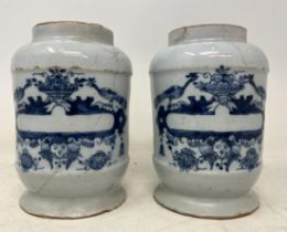 A pair of 19th century Delft pottery jug jars, with a vacant cartouche, repaired/restored, 14 cm