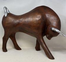 A modern figure of a bull, and assorted African carvings (qty)