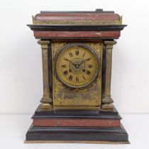 A mantel clock, the gilt dial having a twin train eight day movement, striking on a chime, in a