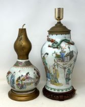 A Chinese famille rose vase, adapted into a lamp, 44 cm high (over fitment), and another similar, 36