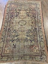 A Persian Kermon rug, 186 x 113 cm