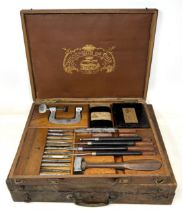 A French wood carvers type set, in a fitted walnut box, 32.5 cm wide, and an artists paintbox, 35.